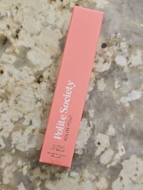 Polite Pout Glossy Lip Balm - Peach Bellini - New, in box - Full Size